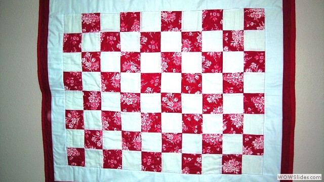 Red floral with white check baby blanket